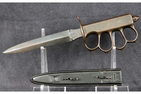 The S35-VN blade is from Les George with the knuck handle by Bawidamann. . Mk1 trench knife for sale